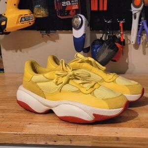 Yellow and Red Chunky Puma Sneakers